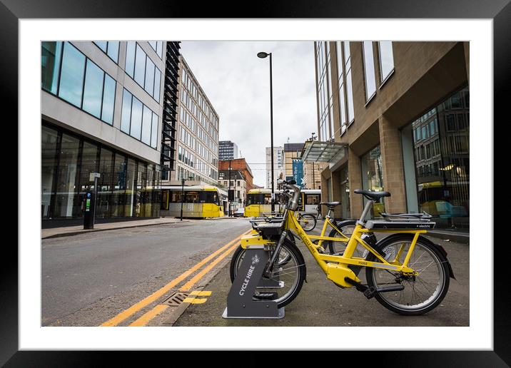 Yellow cycles for hire in Manchester Framed Mounted Print by Jason Wells