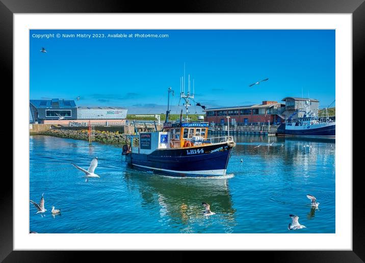 A Fishing Boat arrives in Eyemouth Harbour Framed Mounted Print by Navin Mistry