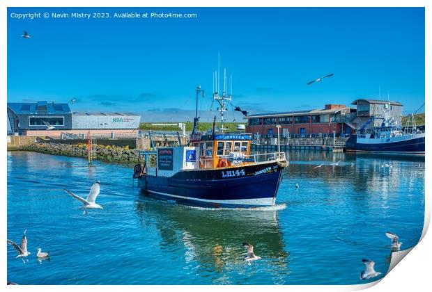 A Fishing Boat arrives in Eyemouth Harbour Print by Navin Mistry