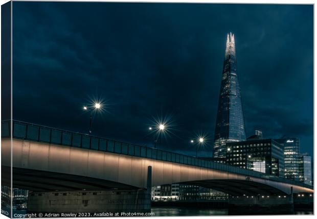 The iconic Shard & London Bridge at blue hour Canvas Print by Adrian Rowley