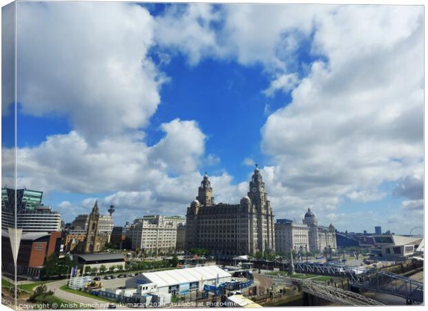 Liverpool England may 30 2023 a view of liverpool port and sourrending area and famous liver building Canvas Print by Anish Punchayil Sukumaran