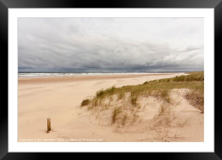 Storm Brewing Over Castlerock Beach Framed Mounted Print by jim Hamilton