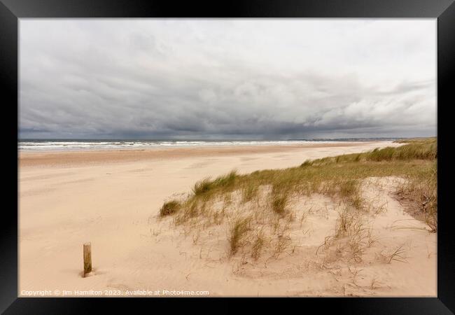 Storm Brewing Over Castlerock Beach Framed Print by jim Hamilton