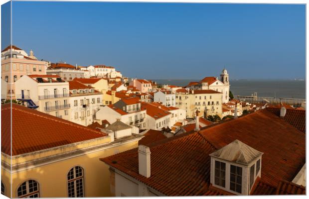 Rooftops of Lisbon Canvas Print by Kevin Winter