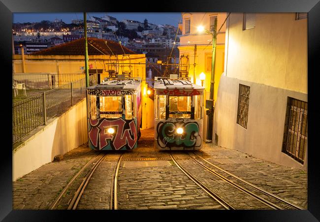 The Funicular Lavra in the narrow streets of Lisbon Framed Print by Kevin Winter