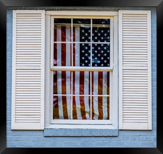 Old Glory through an old window Framed Print by John Hastings