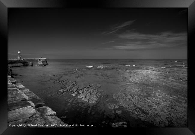 Whitby's East Beach: A Monochrome Perspective Framed Print by Michael Shannon