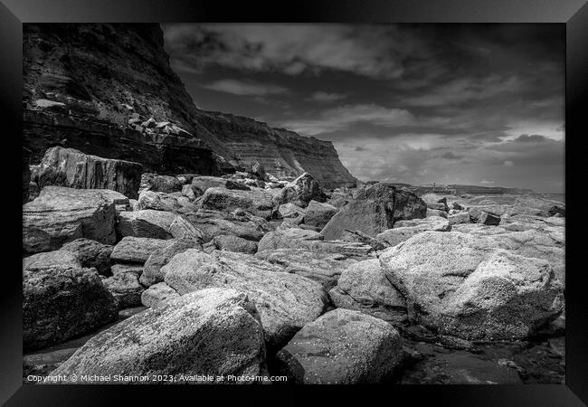 Boulders on Whitby East Beach Framed Print by Michael Shannon