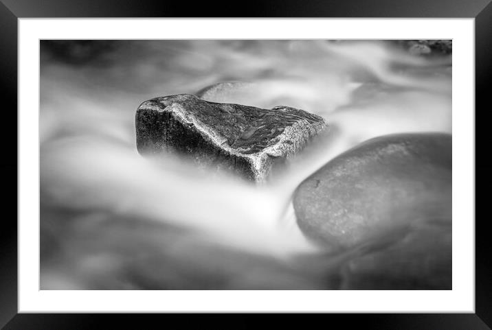 Rock Surrounded by Flowing Water Framed Mounted Print by Kevin Howchin