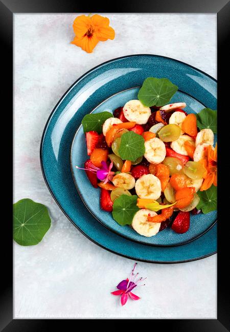 Tasty fruit salad with nasturtium. Framed Print by Mykola Lunov Mykola