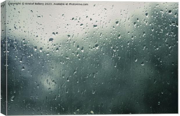 Rain drops on a window with blurry background Canvas Print by Kristof Bellens