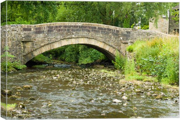 Arched Road bridge into Clapham Yorkshire Dales Canvas Print by Nick Jenkins