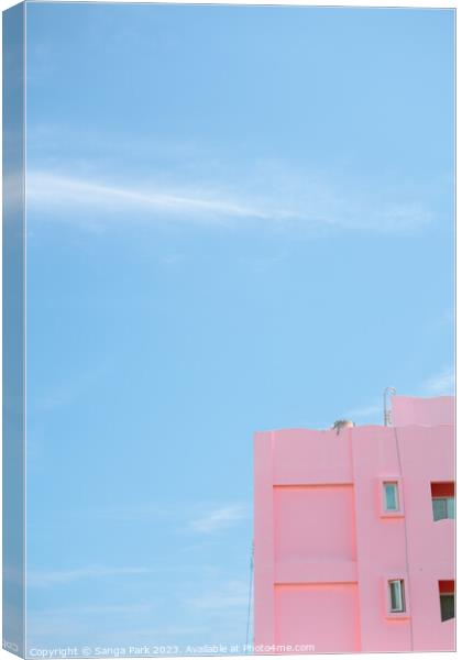 Pink minimal building with blue sky Canvas Print by Sanga Park