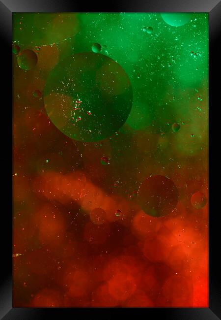 Oil-Flecked Red Against Vibrant Green. Framed Print by youri Mahieu