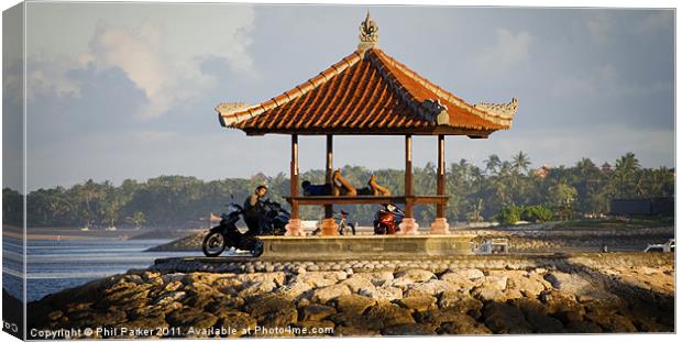 Locals Relaxing in Bali Canvas Print by Phil Parker