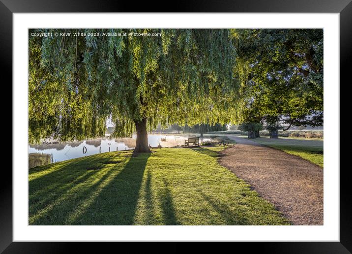 Very bright morning light over Bushy Park ponds Framed Mounted Print by Kevin White