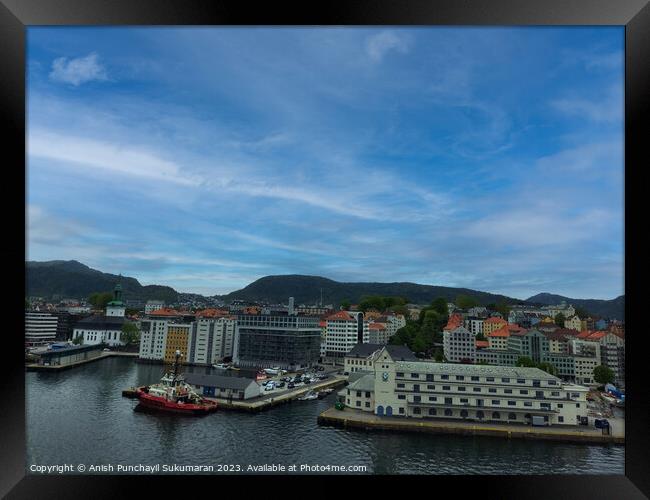 Bergen Norway 22 may 2023 Bergen Cityscape with Beautiful Harbor and Majestic Mountains Framed Print by Anish Punchayil Sukumaran