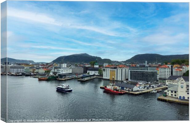 Bergen Norway 22 may 2023 Bergen Cityscape with Beautiful Harbor and Majestic Mountains Canvas Print by Anish Punchayil Sukumaran