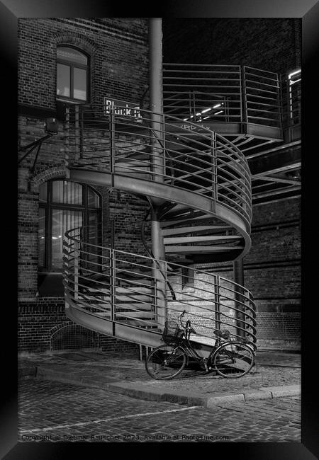 Spiral Staircase and Bicycle in the Speicherstadt of Hamburg Framed Print by Dietmar Rauscher