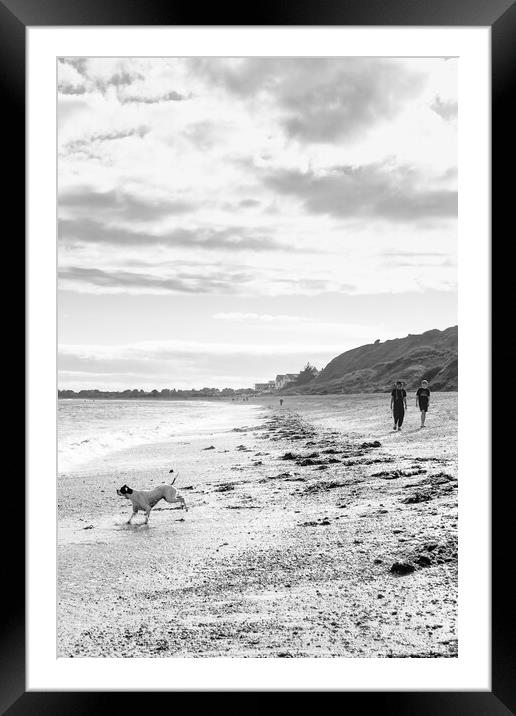 Walking on a beach  Framed Mounted Print by Michelle Quinton