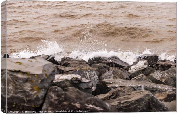 Ocean's Embrace on Rocky Shores of Colwyn Bay Wale Canvas Print by Heidi Hennessey