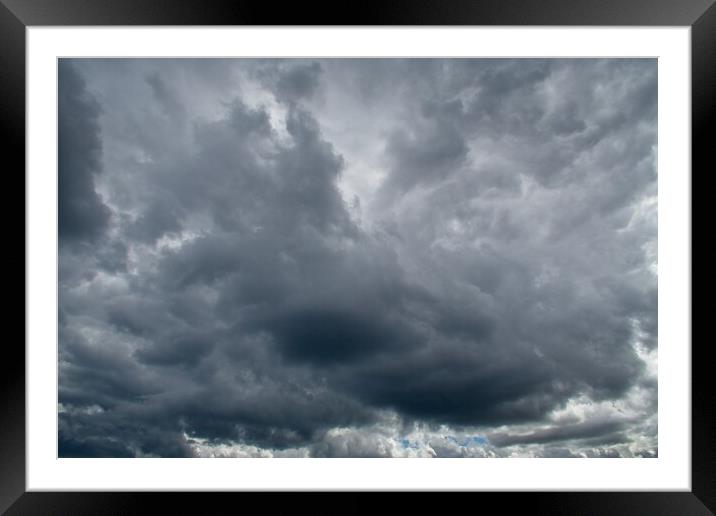 Storm Clouds Brewing Framed Mounted Print by Rob Cole