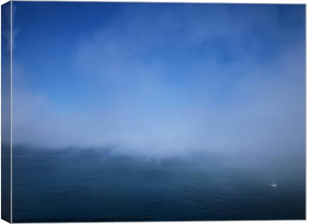 Sea fog yacht Canvas Print by Charles Powell