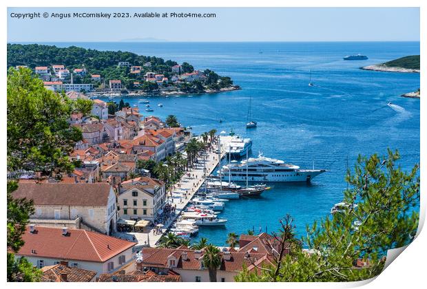 Boats on Riva waterfront in Hvar town, Croatia Print by Angus McComiskey