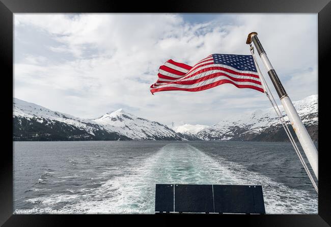American Stars and Stripes flag on the back of a boat in Price William Sound, Alaksa, USA Framed Print by Dave Collins