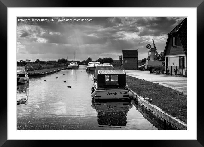 Tranquil waters at Thurne Dyke Framed Mounted Print by Avril Harris