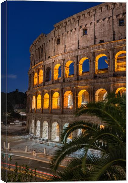 The Colosseum at Night in Rome Canvas Print by Artur Bogacki
