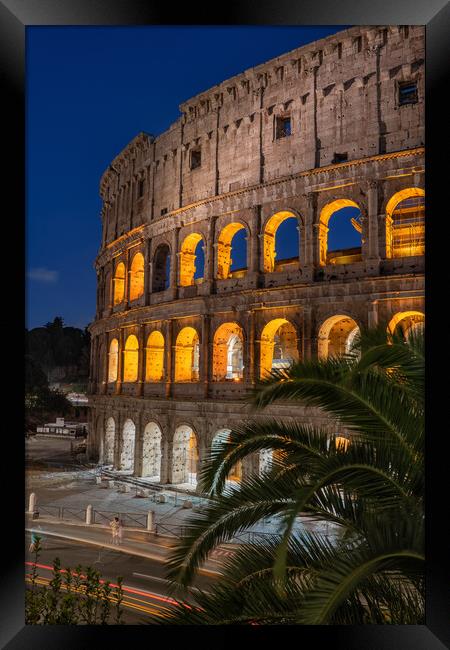 The Colosseum at Night in Rome Framed Print by Artur Bogacki