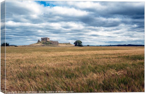 Enigmatic Duffus Castle Under Clouded Skies Canvas Print by Tom McPherson