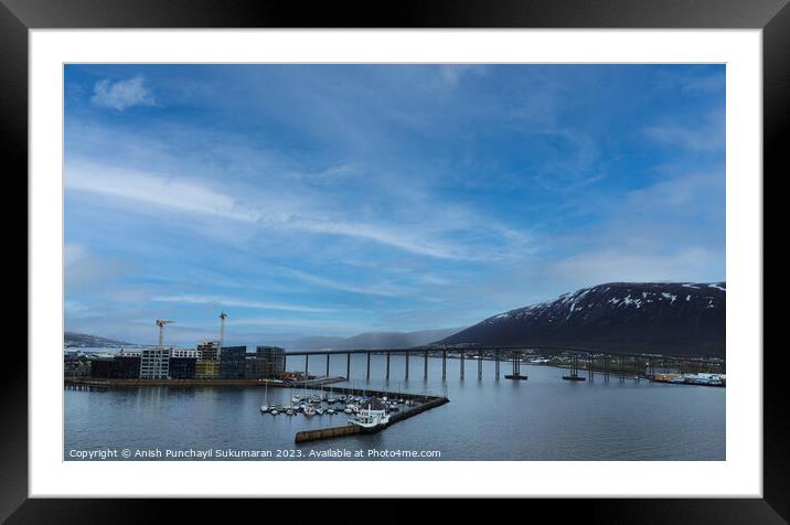 Gleaming Tromso Bridge Reflecting Clouds over the Sea Framed Mounted Print by Anish Punchayil Sukumaran