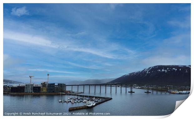 Gleaming Tromso Bridge Reflecting Clouds over the Sea Print by Anish Punchayil Sukumaran