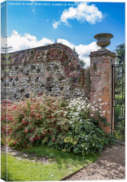 Old brick and flint garden wall Canvas Print by Kevin White