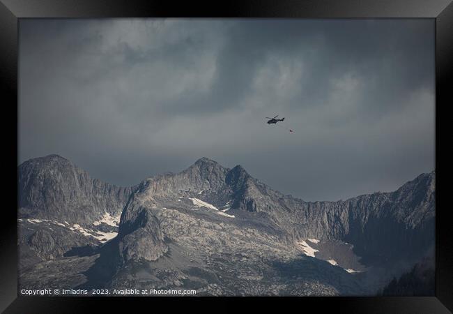 Moody Swiss Mountain with Helicopter Framed Print by Imladris 