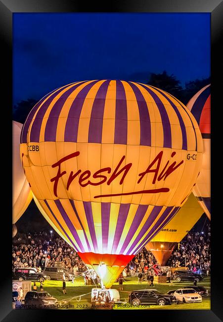 Enchanted Nightglow: Bristol's Air Balloon Fiesta Framed Print by Keith Douglas