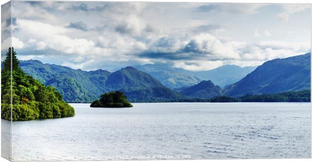A small island in the middle of a body of water Canvas Print by Barry Henderson Photography