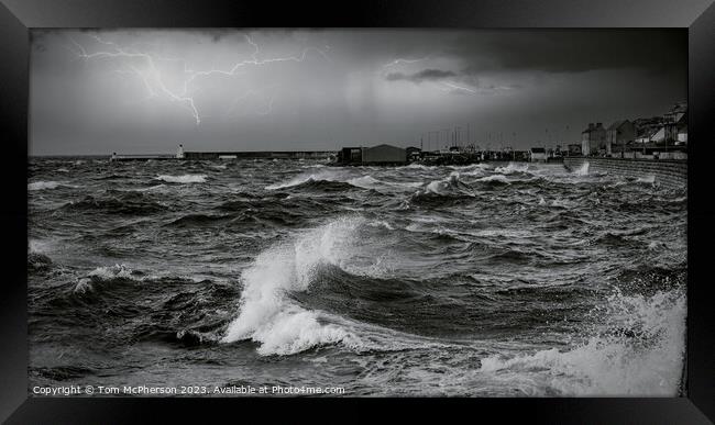 Conquering Nature's Fury Framed Print by Tom McPherson