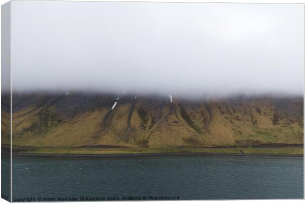 Tranquil Scene Amidst Icelandic Fog and Nature Beauty Canvas Print by Anish Punchayil Sukumaran
