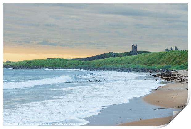 Coastal Serenity Unveiled at Dunstanburgh Print by Alan Dunnett