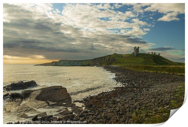 Coastal Haven: Dunstanburgh Castle Print by Alan Dunnett