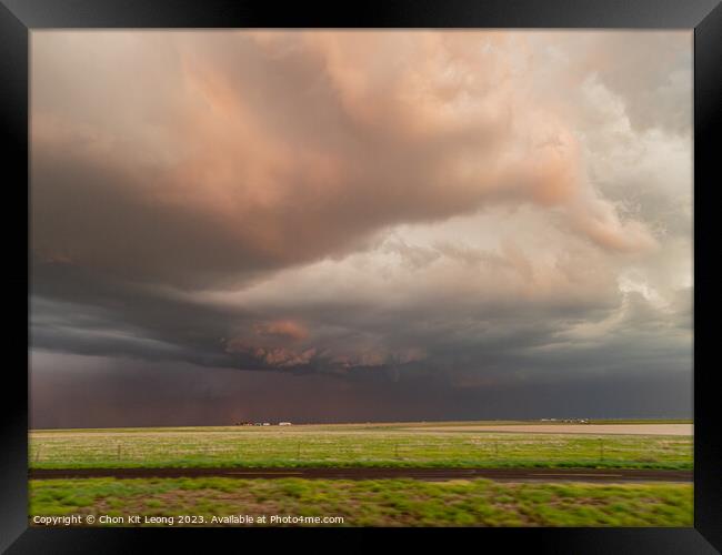 Thunderstorm over the sky in Amarillo country side area Framed Print by Chon Kit Leong