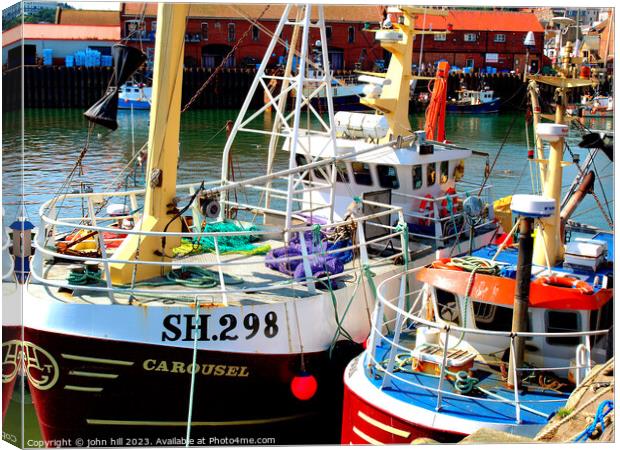 Fishing boats, Scarborough, Yorkshire. Canvas Print by john hill