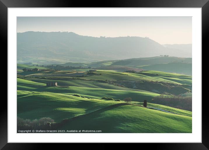 Spring in Tuscany, landscape in late afternoon. Pienza, Italy Framed Mounted Print by Stefano Orazzini