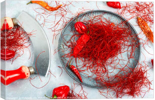 Cutting red chilly peppers. Canvas Print by Mykola Lunov Mykola