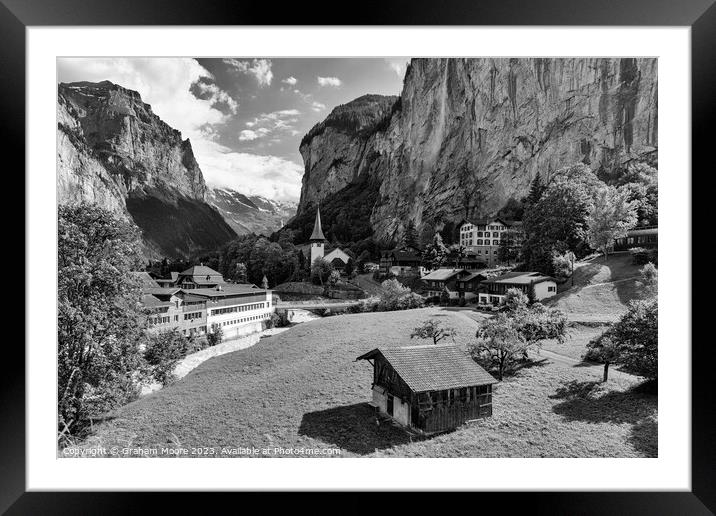 Lauterbrunnen village and Staubbach falls monochrome Framed Mounted Print by Graham Moore