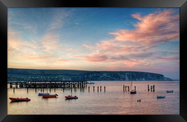 Swanage Pier and Ballard Down at Sunset Framed Print by Darren Galpin