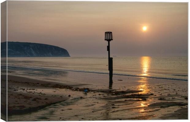 Sunrise over Swanage Bay, Dorset Canvas Print by Darren Galpin